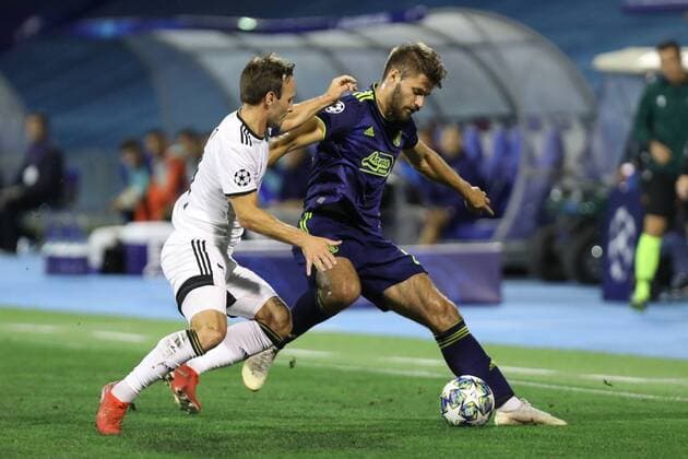 Zagreb, 21 08 2019 - Stadion Maksimir, Play-offs, 1st leg. GNK Dinamo (blue) - Rosenborg BK (white) Bruno Petkovic (21) vs Mike Jensen (7) 