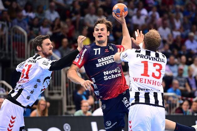 Handball Pixum Super Cup 2019 SG Flensburg Handewitt THW Kiel on 21 08 2019 at the ISS Dome in Düsseldorf Hendrik Pekeler Kiel , left Magnus Rod Flensburg , centre Steffen Weinhold Kiel , right xRx