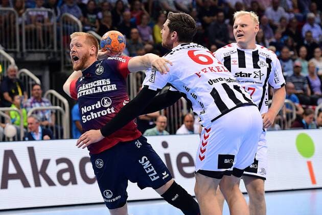 Handball Pixum Super Cup 2019 SG Flensburg Handewitt THW Kiel on 21 08 2019 in the ISS Dome in Düsseldorf Jim Gottfridsson Flensburg , left Hendrik Pekeler Kiel , right xRx