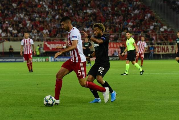 Greece: Olympiacos vs Krasnodar Bouchalakis (no 5) of Olympiacos tries to avoid Vilhena (no 52) of Krasnodar. Piraeus Attiki Greece Stadio Georgics Karaiskakis  DimitriosxKarvountzis PacificxPress