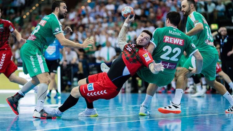 Johan Koch 77 Fuechse Berlin , Marko Mamic 22 SC DHFK Leipzig during the season 2019 2010 in the 1 Handball Bundesliga Men between SC DHfK Leipzig and Füchse Berlin in the Arena Leipzig on 25 August 2019 in Leipzig, Saxony, Germany