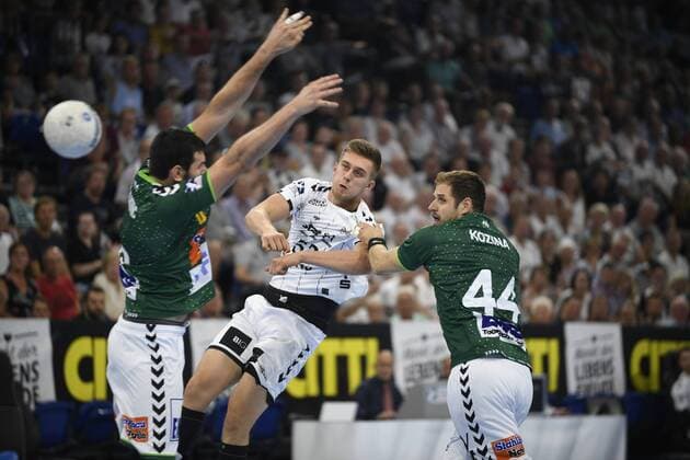 Nikola Bilyk THW Kiel Gege Nemanja Zelenovic left and Kresimir Kozina Frisch Auf , Liqui Moly Handball Bundesliga, Men, 1 matchday, THW Kiel vs FA Göppingen, 25 08 19 Kiel Sparkassen Arena Schleswig Holstein Germany