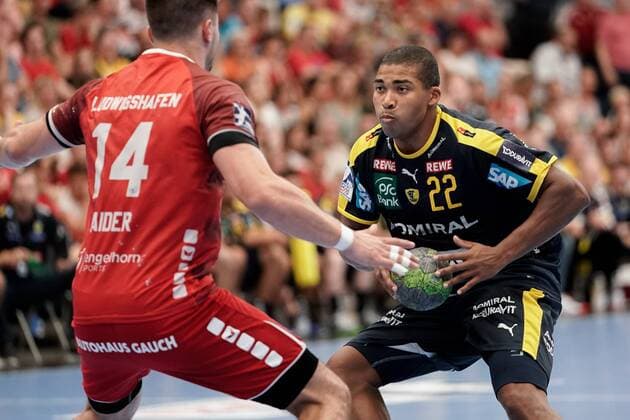 v li Maximilian Haider The Owls, 14 , Mads Mensah Larsen RNL, 22 , Action, Action, Game scene, 25 08 2019, Ludwigshafen am Rhein, Handball, Bundesliga, TSG Ludwigshafen Friesenheim The Owls Rhine Neckar Lions xozx
