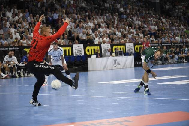 Dario Quenstedt THW Kiel parries against Marcel Schiller Frisch Auf , Liqui Moly Handball Bundesliga, Men, 1 matchday, THW Kiel vs FA Göppingen, 25 08 19 Kiel Sparkassen Arena Schleswig Holstein Germany