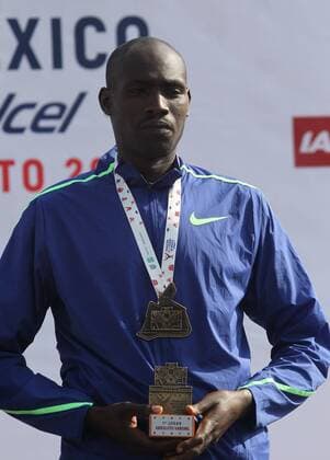 Duncan Maiyo pose with the gold medal in the Marathon of Mexico City 2019, in Mexico City, Mexico, 25 August 2019. Kenyans Vivian Kiplagat, with a new record, and Duncan Maio, in a slow race, won the Mexico City Marathon on Sunday, which ran with some 25,000 runners at 2,240 meters above sea level. Kenyans Kiplagat and Maio win the Mexico City Marathon !ACHTUNG: NUR REDAKTIONELLE NUTZUNG! Copyright: xMarioxGuzmanx AME123 20190825-637023632624056313