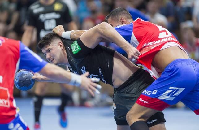 25 8 2019, Dresdens Phillip Jungemann in the grip of Eisenachs Luka Kikanovic, Handball, 2 Bundesliga, HC Elbflorenz Dresden ThSV Eisenach 28 26, c MR