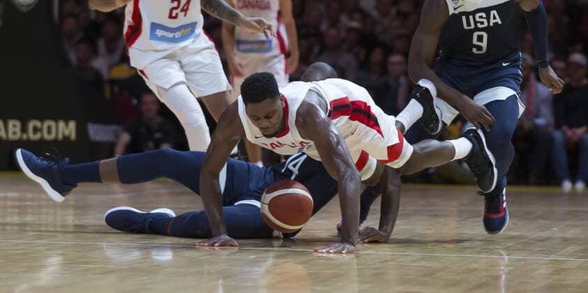 BASKETBALL CANADA USA, Khris Middleton of the USA and Melvin Ejim of Canada collide during the Pre-FIBA World Cup series match between Canada and the USA at Qudos Bank Arena in Sydney, Monday, August 26, 2019. ( NO ARCHIVING, EDITORIAL USE ONLY, NO USE IN BOOKS WITHOUT CONSENT SYDNEY NSW AUSTRALIA  Copyright: xCRAIGxGOLDINGx 20190826001415009966
