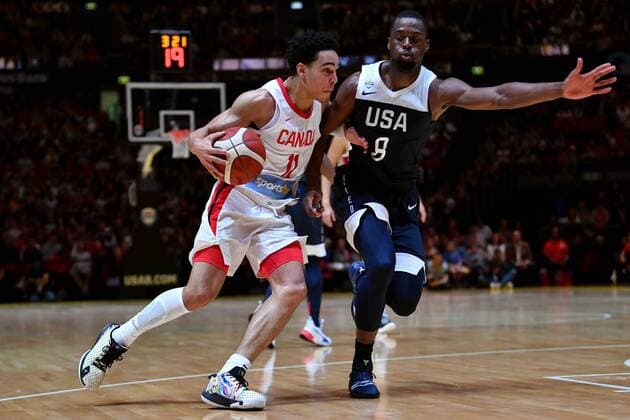 BASKETBALL CANADA USA, Andrew Nembhard of Canada tries to beat Harrison Barnes of the USA during the Pre-FIBA World Cup series match between Canada and the USA at Qudos Bank Arena in Sydney, Monday, August 26, 2019. ( NO ARCHIVING, EDITORIAL USE ONLY, NO USE IN BOOKS WITHOUT CONSENT SYDNEY NSW AUSTRALIA  Copyright: xDEANxLEWINSx 20190826001415020748