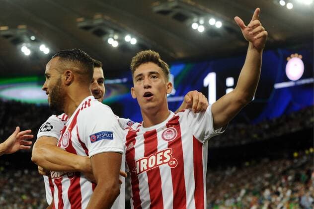 KRASNODAR, RUSSIA - AUGUST 27, 2019: Olympiacos FC s Youssef El Arabi (L front) and Kostas Tsimikas (R) celebrate a goal in the sesond leg of the 2019-20 UEFA Champions League play-off football match between FC Krasnodar and Olympiacos FC at Krasnodar Stadium. Maxim Romanov TASS  TS0B834A