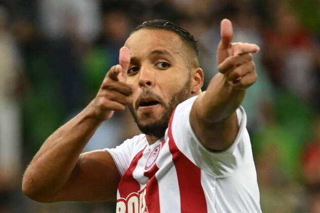 KRASNODAR, RUSSIA - AUGUST 27, 2019: Olympiacos FC s Youssef El Arabi celebrates a goal in the senond leg of the 2019-20 UEFA Champions League play-off football match between FC Krasnodar and Olympiacos FC at Krasnodar Stadium; Olympiacos FC won 2-1. Maxim Romanov TASS  TS0B8361