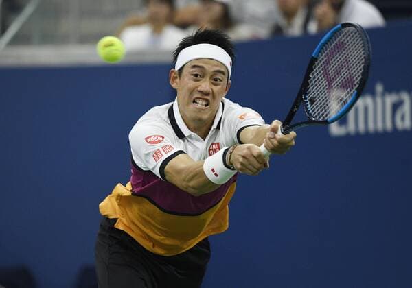 FLUSHING MEADOW, NY - AUGUST 28: Kei Nishikori (JPN) stretching for a wide backhand during his 2nd round match at the US Open, on August 28, 2019, played at the Billie Jean King Tennis Center, Flushing Meadow, NY. (Photo by Cynthia Lum Icon Sportswire) TENNIS: AUG 28 US Open Icon25019082831