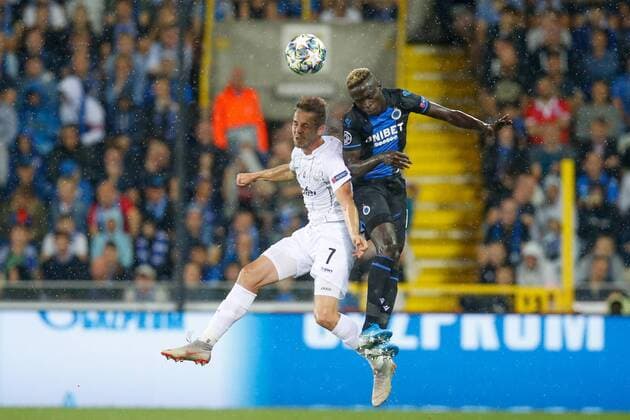 LASK s Rene Renner and Club s Krepin Diatta fight for the ball during a game between Belgian soccer team Club Brugge and Austrian club LASK Linz, Wednesday 28 August 2019 in Brugge, the return match in the play-offs of the UEFA Champions League, after a 0-1 victory of Club in the first leg. BRUNOxFAHY  x05650841x