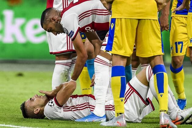 AMSTERDAM , 29-08-2019 , Johan Cruijff ArenA , Champions League playoff, season 2019-2020 , Ajax player Dusan Tadic injury during the match Ajax - APOEL Nicosia Ajax - APOEL Nicosia  x4211949x Copyright: