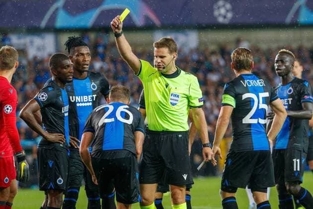 Club s Mats Rits receives a yellow card from referee Felix Brynch during a game between Belgian soccer team Club Brugge and Austrian club LASK Linz, Wednesday 28 August 2019 in Brugge, the return match in the play-offs of the UEFA Champions League, after a 0-1 victory of Club in the first leg. KURTxDESPLENTER  x05650933x