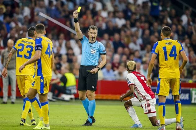 AMSTERDAM , 29-08-2019 , Johan Cruijff ArenA , Champions League playoff, season 2019-2020 , APOEL Nicosia player Urosh Matich gets a yellow card during the match Ajax - APOEL Nicosia Ajax - APOEL Nicosia  x4212129x Copyright: