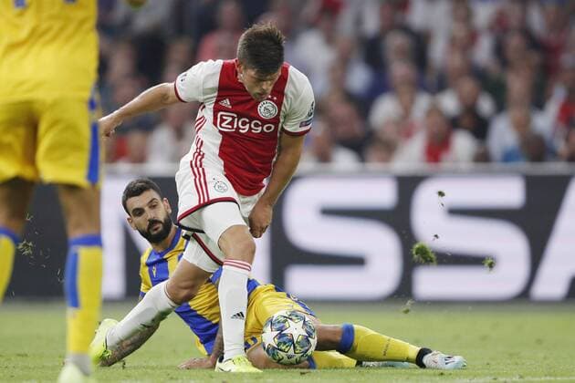 (L-R) Giorgos Merkis of APOEL FC, Klaas Jan Huntelaar of Ajax during the UEFA Champions League play off qualifying second leg match between Ajax Amsterdam and APOEL FC at the Johan Cruijff Arena on August 28, 2019 in Amsterdam, The Netherlands UEFA Champions League 2019 2020 xVIxVIxImagesx xMauricexvanxSteenxIVx 201353156