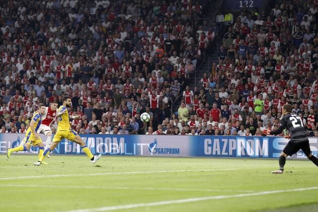 (L-R) Dragan Mihajlovic of APOEL FC, Dusan Tadic of Ajax, Giorgos Merkis of APOEL FC, APOEL FC goalkeeper Vid Belec 2-0 during the UEFA Champions League play off qualifying second leg match between Ajax Amsterdam and APOEL FC at the Johan Cruijff Arena on August 28, 2019 in Amsterdam, The Netherlands UEFA Champions League 2019 2020 xVIxVIxImagesx xMauricexvanxSteenxIVx 201353289