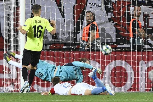 From left MATEO SUSIC, goalie GIEDRIUS ARLAUSKIS, both of CFR Cluj - Napoca and MILAN SKODA of Slavia in action during the Football Champions League 4th qualifying round return match: Slavia Prague vs Cluj-Napoca in Sinobo Stadium, Prague, Czech Republic, August 28, 2019. (CTKxPhoto MichalxKamaryt) CTKPhotoP201908281049101  kmt 8