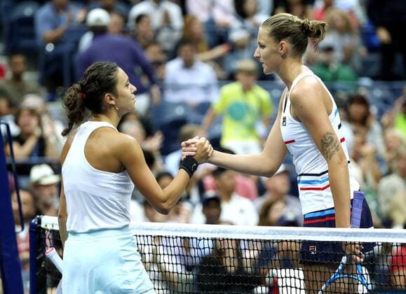 Mariam Bolkvadze of Georgia, left, and Karolina Pliskova of the Czech Republic shake hands at the net after their second round match at the 2019 US Open Tennis Championships at the USTA Billie Jean King National Tennis Center on Wednesday, August 28, 2019 in New York City. Pliskova won 6-1, 6-4.  NYP20190829316 MONIKAxGRAFF