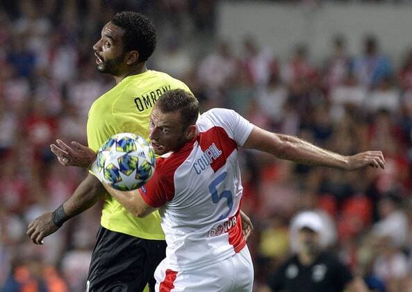 From left BILLEL OMRANI of CFR Cluj - Napoca and VLADIMIR COUFAL of Slavia in action during the Football Champions League 4th qualifying round return match: Slavia Prague vs Cluj-Napoca in Sinobo Stadium, Prague, Czech Republic, August 28, 2019. (CTKxPhoto KaterinaxSulova) CTKPhotoP201908281014401  suk1