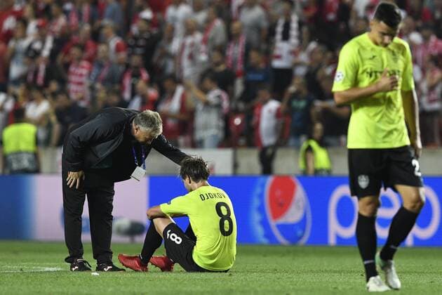 From left coach of CFR Cluj DAN PETRESCU and soccer player DAMJAN DJOKOVIC after the Football Champions League 4th qualifying round return match: Slavia Prague vs Cluj-Napoca in Sinobo Stadium, Prague, Czech Republic, August 28, 2019. Slavia Prague defeated Cluj 1-0 in football return match of Champions League 4th qualifying round and advanced to the group stage. (CTKxPhoto MichalxKamaryt) CTKPhotoP201908281073101  kmt 12