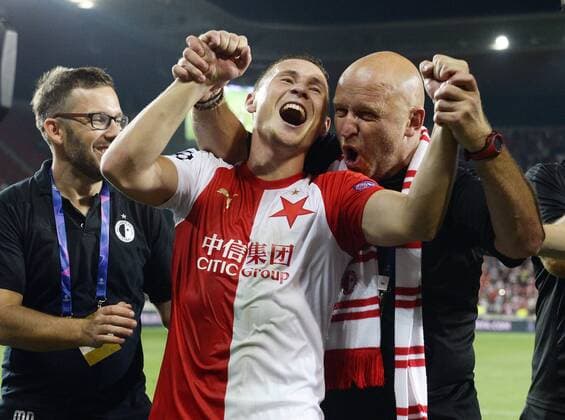 Slavia Prague defeated Cluj 1-0 in football return match of Champions League 4th qualifying round and advanced to the group stage. Soccer players celebrate a victory in Sinobo Stadium, Prague, Czech Republic, August 28, 2019. Centre is Jan Boril of Slavia and right is coach assistant Zdenek Houstecky. (CTKxPhoto KaterinaxSulova) CTKPhotoP201908281079601  suk2