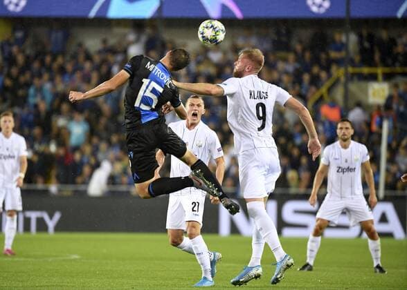 BRUGGE, BELGIUM - AUGUST 28 : Klauss of LASK and Matej Mitrovic defender of Club Brugge during the Champions League Play-offs 2nd leg match game between Club Brugge and LASK on August 28, 2019 in Brugge, Belgium, 28 08 2019 ( Photo by {Byline:Pc} Photonews FOOTBALL : Club Brugge vs LASK - Champions League Play-offs - 28 08 2019 PHOTONEWS PANORAMIC 
