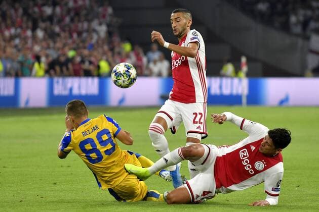 Hakim Ziyech (Ajax) and Edson Alvarez (Ajax) duel Roman Bezjak (Apoel) during the UEFA Champions League play-offs 2nd leg Ajax-Apoel on August 28 2019 in Amsterdam, Netherlands. Noxthirdxpartyxsales  (110762790)