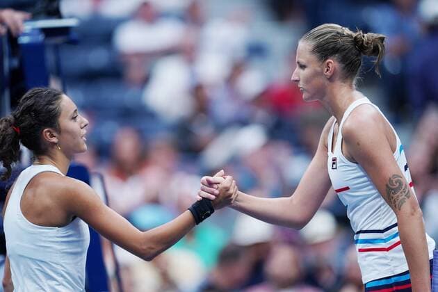 (190829) -- NEW YORK, Aug. 29, 2019 -- Karolina Pliskova (R) of the Czech Republic shakes hands with Mariam Bolkvadze of Georgia after the women s singles 2nd round match between Karolina Pliskova of the Czech Republic and Mariam Bolkvadze of Georgia at the 2019 US Open in New York, the United States, Aug. 28, 2019. ) (SP)U.S.-NEW YORK-TENNIS-US OPEN-WOMEN S SINGLES LiuxJie 
