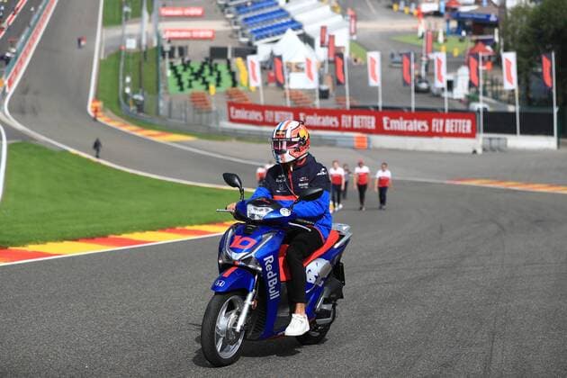 29th Aug 2019, Circuit Spa Francorchamps, Stavelot, Belgium; Formula 1 Johnnie Walker Belgian Grand Prix; Arrivals Day; Scuderia Toro Rosso, Pierre Gasly rides a scooter up Eau Rouge - Editorial Use Only.  ActionPlus12163808 Octane
