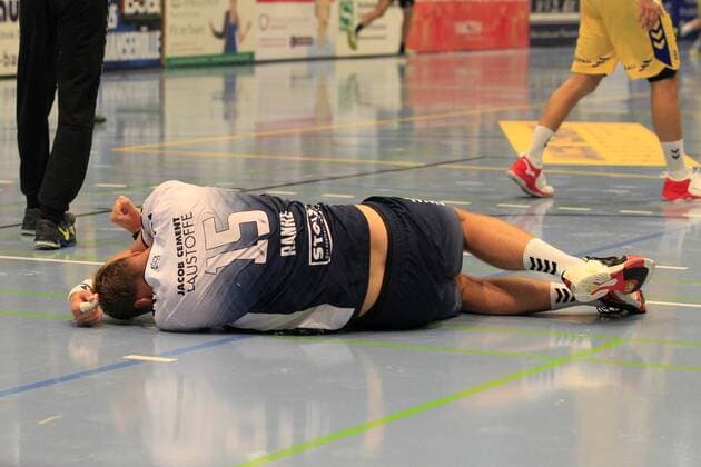 2 Bundesliga Handball VfL Luebeck Schwartau VfL Gummersbach 30 08 2019, Hansehalle Luebeck, GER, VfL Luebeck Schwartau VfL Gummersbach in picture picture shows injured injury pain Fynn Ranke VfL Luebeck Schwartau is down nordphotox xTauchnitz nph00059