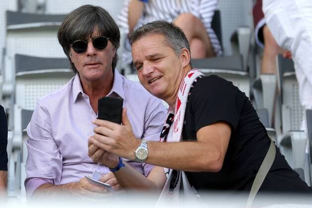 Freiburg, Germany 31 08 2019, 1 Bundesliga, SC Freiburg vs 1 FC Koeln, 3 matchday, national coach Joachim Loew with a fan Schaut, looks on, Freiburg Schwarzwaldstadion Baden Wuerttemberg Germany eu images 09 541 025373 eu-images-541 DFL REGULATIONS PROHIBIT ANY USE OF PHOTOGRAPHS AS IMAGE SEQUENCES AND OR QUASI-VIDEO.