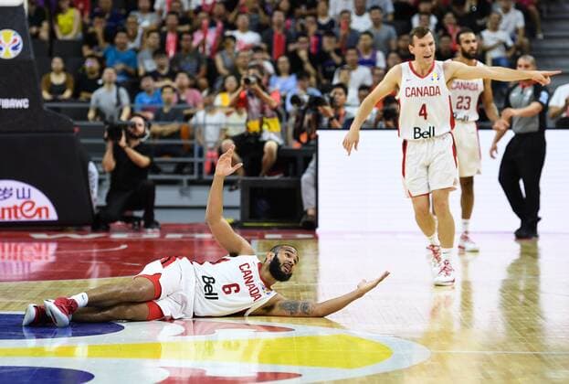 (190901) -- DONGGUAN, Sept. 1, 2019 -- Cory Joseph (L) of Australia reacts to referee during the group H match between Australia and Canada at the 2019 FIBA World Cup in Dongguan, south China s Guangdong Province, Sept.1, 2019. ) (SP)CHINA-DONGGUAN-BASKETBALL WM FIBA WORLD CUP-GROUP H-AUSTRALIA VS CANADA (CN) DengxHua 