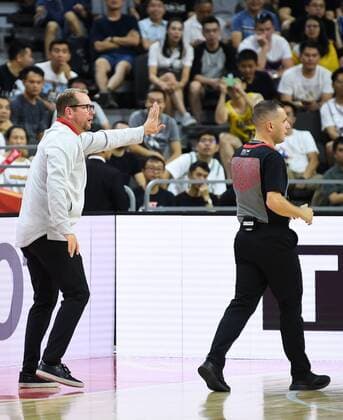 (190901) -- DONGGUAN, Sept. 1, 2019 -- Nick Nurse (L), head coach of Canada, talks with referee during the group H match between Australia and Canada at the 2019 FIBA World Cup in Dongguan, south China s Guangdong Province, Sept.1, 2019. ) (SP)CHINA-DONGGUAN-BASKETBALL WM FIBA WORLD CUP-GROUP H-AUSTRALIA VS CANADA (CN) DengxHua 