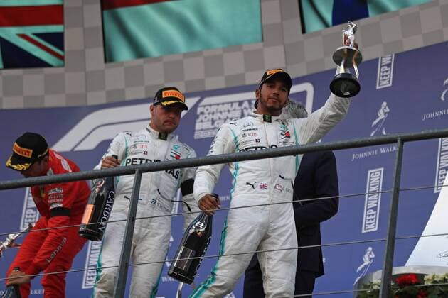 1st September 2019; Spa-Francorchamps racing circuit , Stavelot, Belgium; Formula 1 Grand Prix of Belgium, Race Day; Mercedes AMG Petronas Motorsport, Lewis Hamilton holds uo his 2nd placed trophy - Editorial Use Only.  ActionPlus12164879 Octane