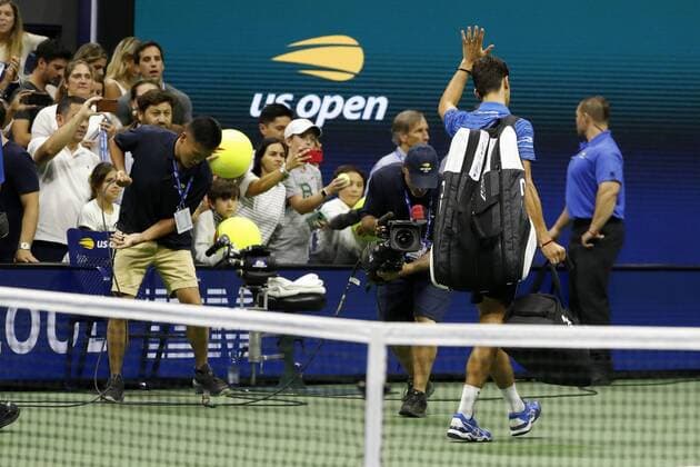 (190902) -- NEW YORK, Sept. 2, 2019 -- Novak Djokovic of Serbia walks off the court after the men s singles fourth round match between Novak Djokovic of Serbia and Stan Wawrinka of Switzerland at the 2019 US Open tennis championships in New York, the United States, Sept. 1, 2019. Wawrinka advanced into quarterfinals as Djokovic retired. ) (SP)US-NEW YORK-TENNIS-US OPEN-MEN S SINGLES LixMuzi 