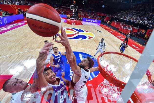 (190903) -- SHENZHEN, Sept. 3, 2019 -- Gelvis Solano (2nd L) of Dominican Republic vies for the ball during the group G match between Germany and Dominican Republic at the FIBA World Cup 2019 in Shenzhen, south China s Guangdong Province, Sept. 3, 2019. ) (SP)CHINA-SHENZHEN-BASKETBALL WM FIBA WORLD CUP-GROUP D-GER VS DOM (CN) YangxLei 
