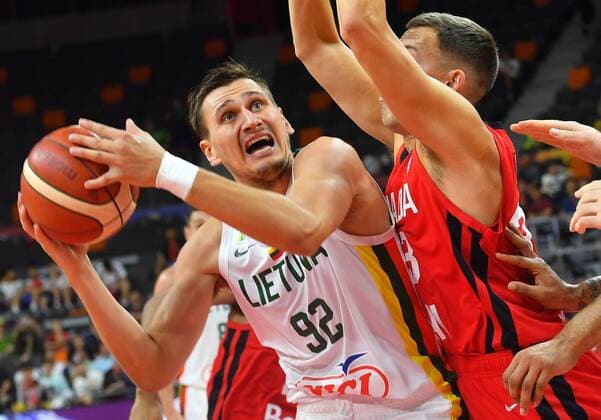 (190903) -- DONGGUAN, Sept. 3, 2019 -- Edgaras Ulanovas (L) of Lithuania breaks through during the group H match between Lithuania and Canada at the 2019 FIBA World Cup in Dongguan, south China s Guangdong province, Sept. 3, 2019. ) (SP)CHINA-DONGGUAN-BASKETBALL WM FIBA WORLD CUP-GROUP H-LITHUANIA VS CANADA (CN) ZhuxZheng 