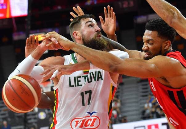 (190903) -- DONGGUAN, Sept. 3, 2019 -- Jonas Valanciunas (L) of Lithuania is fouled during the group H match between Lithuania and Canada at the 2019 FIBA World Cup in Dongguan, south China s Guangdong province, Sept. 3, 2019. ) (SP)CHINA-DONGGUAN-BASKETBALL WM FIBA WORLD CUP-GROUP H-LITHUANIA VS CANADA (CN) ZhuxZheng 
