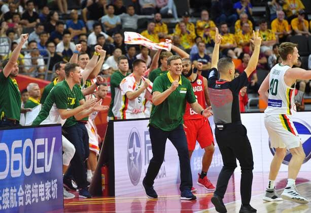 (190903) -- DONGGUAN, Sept. 3, 2019 -- Players and coaches of Lithuania celebrate after the group H match between Lithuania and Canada at the 2019 FIBA World Cup in Dongguan, south China s Guangdong Province, Sept. 3, 2019. ) (SP)CHINA-DONGGUAN-BASKETBALL WM FIBA WORLD CUP-GROUP H-LITHUANIA VS CANADA (CN) ZhuxZheng 