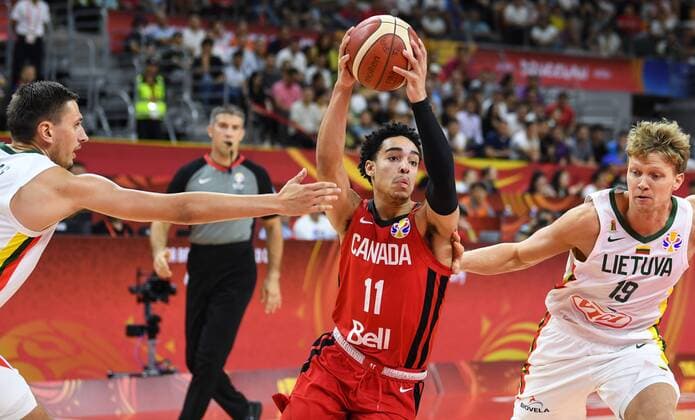 (190903) -- DONGGUAN, Sept. 3, 2019 -- Domantas Sabonis (C) of Canada breaks through during the group H match between Lithuania and Canada at the 2019 FIBA World Cup in Dongguan, south China s Guangdong Province, Sept. 3, 2019. ) (SP)CHINA-DONGGUAN-BASKETBALL WM FIBA WORLD CUP-GROUP H-LITHUANIA VS CANADA (CN) DengxHua 