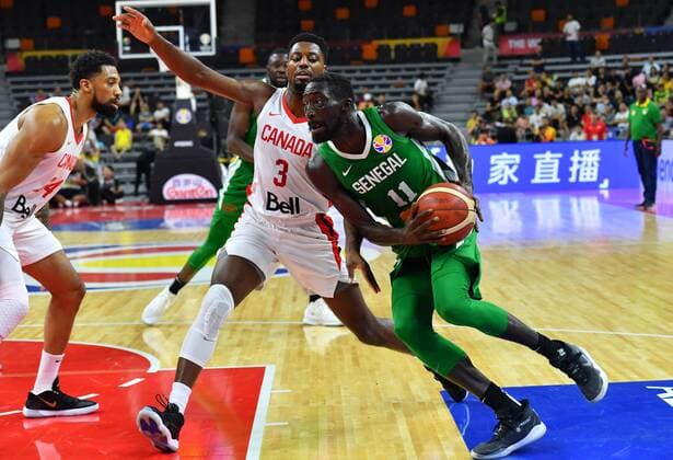 (190905) -- DONGGUAN, Sept. 5, 2019 -- Mouhammad Faye (1st R) of Senegal competes during the group H match between Senegal and Canada at the 2019 FIBA World Cup in Dongguan, south China s Guangdong Province, Sept. 5, 2019. ) (SP)CHINA-DONGGUAN-BASKETBALL WM FIBA WORLD CUP-GROUP H-SENEGAL VS CANADA (CN) ZhuxZheng 