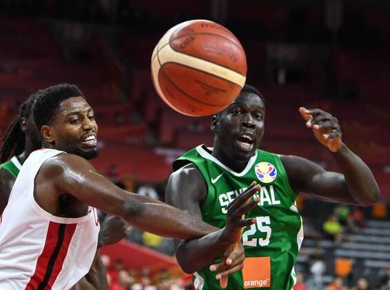 (190905) -- DONGGUAN, Sept. 5, 2019 -- Momar Ndoye (R) of Senegal competes with Momar Ndoye of Canada during the group H match between Senegal and Canada at the 2019 FIBA World Cup in Dongguan, south China s Guangdong Province, Sept. 5, 2019. ) (SP)CHINA-DONGGUAN-BASKETBALL WM FIBA WORLD CUP-GROUP H-SENEGAL VS CANADA (CN) DengxHua 