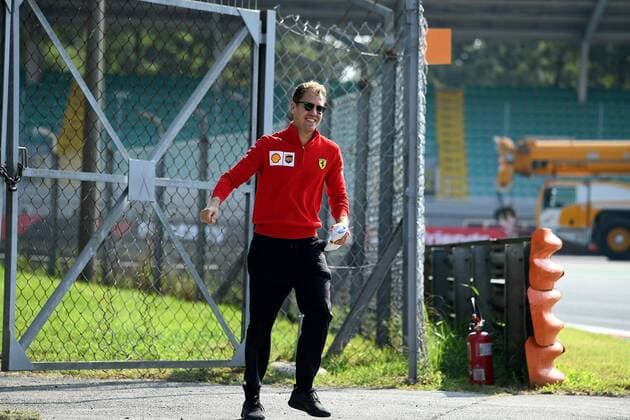 FORMULA 1 GRAN PREMIO HEINEKEN D ITALIA 2019 05 09 2019, Autodromo Nazionale di Monza, Monza, FORMULA 1 GRAN PREMIO HEINEKEN D ITALIA 2019, in the picture Sebastian Vettel GER 5 , Scuderia Ferrari Mission Winnow goes with his engineers across the track nordphotoxBratic nph00250
