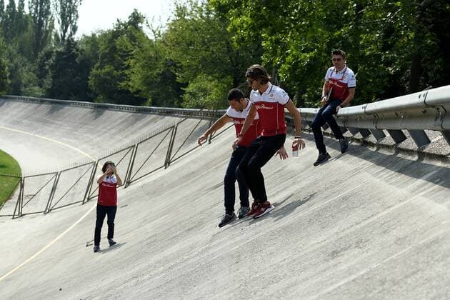 FORMULA 1 GRAN PREMIO HEINEKEN D ITALIA 2019 05 09 2019, Autodromo Nazionale di Monza, Monza, FORMULA 1 GRAN PREMIO HEINEKEN D ITALIA 2019, in the picture Antonio Giovinazzi ITA 99 , Alfa Romeo Racing goes with his engineers over the track Here he is at the old steep curve nordphotoxBratic nph00250