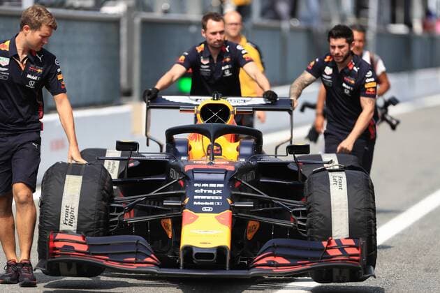 5th September 2019; Autodromo Nazionale, Monza, Italy; Formula 1 Grand Prix of Italy, team arrival day; Red Bull Racing Mechanics push the car of Max Verstappen car down the pit lane - Editorial Use Only.  ActionPlus12165302 Octane