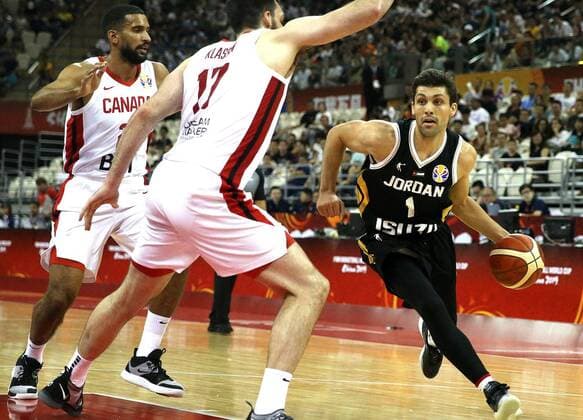 (190907) -- SHANGHAI, Sept. 7, 2019 -- Amin Abu Hawwas (R) of Jordan breaks through during the group P match between Canada and Jordan at the 2019 FIBA World Cup in Shanghai, east China, on Sept. 7, 2019. ) (SP)CHINA-SHANGHAI -BASKETBALL-FIBA WORLD CUP-GROUP P-CANADA VS JORDAN(CN) ChenxFei 