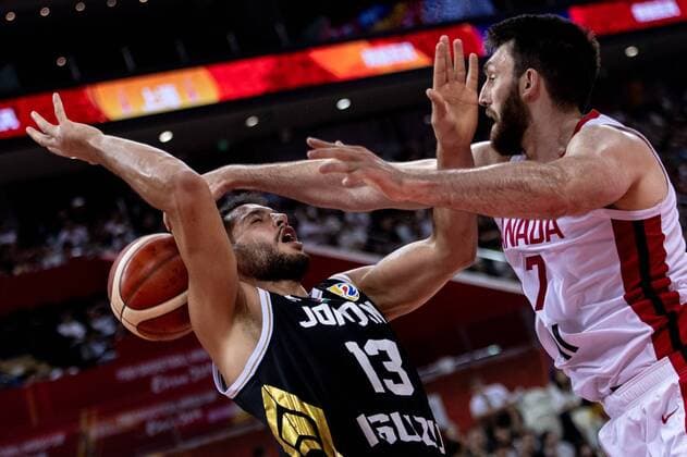 Jordanian professional basketball player Mohammad Hussein, left, loses the ball at the 17-32 classification round of Group P Canada vs Jordan 2019 FIBA Basketball World Cup in Shanghai, China, 7 September 2019. Canada defeated Jordan at the 17-32 classification round of Group P 2019 FIBA Basketball World Cup 126-71. Canada defeated Jordan at the 17-32 classification round of Group P 2019 FIBA Basketball World Cup  749907350174564634