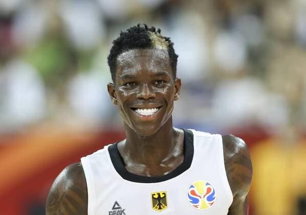 Sport Bilder des Tages (190907) -- SHANGHAI, Sept. 7, 2019 -- Dennis Schroder of Germany smiles during the group P match between Germany and Senegal at the 2019 FIBA World Cup in Shanghai, east China, on Sept. 7, 2019. ) (SP)CHINA-SHANGHAI -BASKETBALL-FIBA WORLD CUP-GROUP P-GERMANY VS SENEGAL(CN) DingxTing 