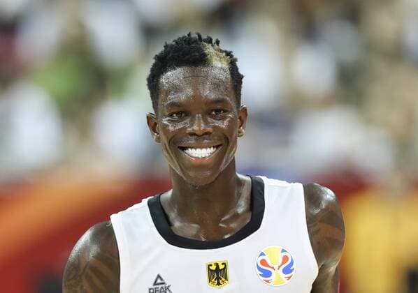 (190908) -- BEIJING, Sept. 8, 2019 -- Dennis Schroder of Germany smiles during the group P match between Germany and Senegal at the 2019 FIBA World Cup in Shanghai, east China, on Sept. 7, 2019. ) XINHUA PHOTOS OF THE DAY DingxTing 